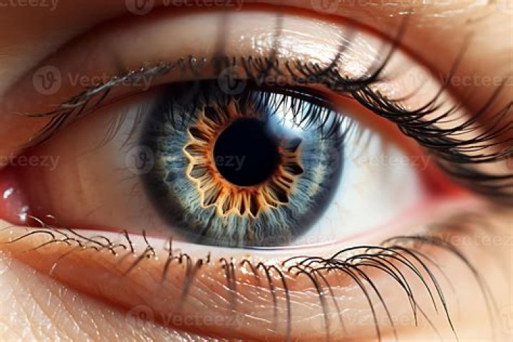 a close up of a person wearing glasses