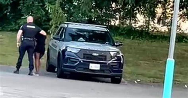 The cop was seen getting into the back of the cruiser himself before they emerged 40 minutes later according to witnesses