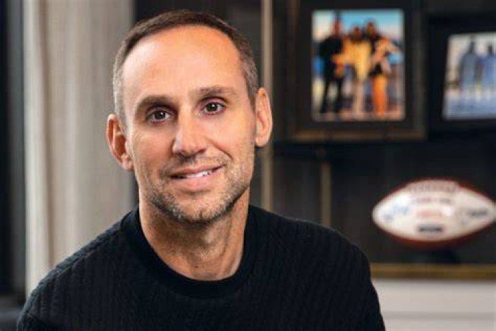 Who is Michael Rubin, and why is he friends with so many famous people?